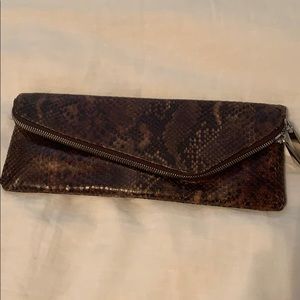 Henri Bendel snakeskin clutch.